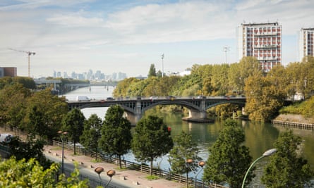 A bridge over the tree-lined Seine River