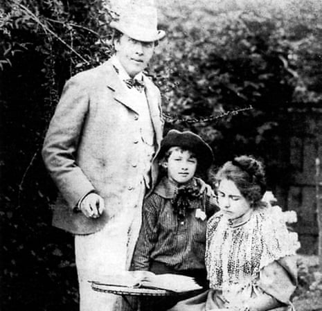 Oscar Wilde with his wife Constance and one of their sons