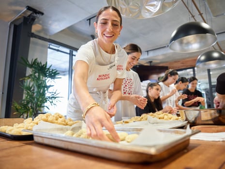 Karima Hazim and Bake for Gaza volunteers prepare ma’moul biscuits for baking at a Sydney cafe