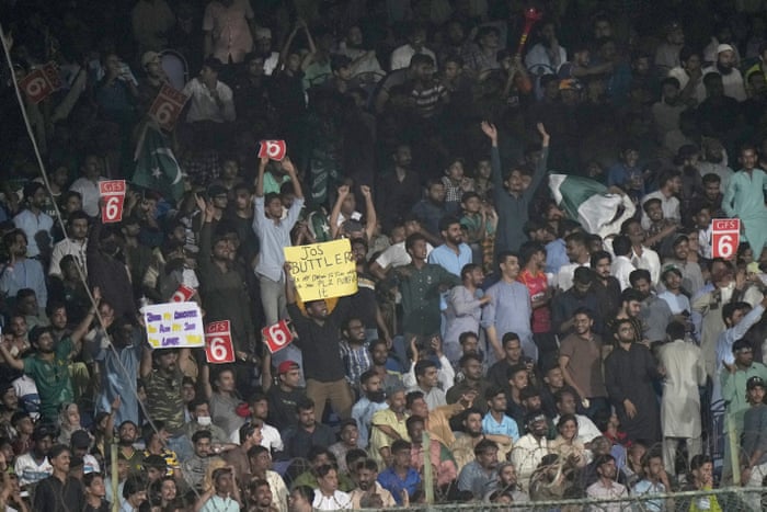 Pakistan v England: first men’s T20 cricket international – live | Pakistan v England 2022 2 Spectators, some holding placards, cheer for the teams.