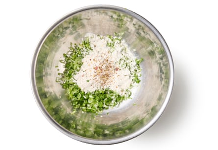 01a Felicity Cloake’s Taiwanese scallion or spring onion pancake 3. When you’re ready to cook, finely chop the spring onions, white and green parts alike, trimming off the bases and the very tops, and put them in a heatproof bowl with the flour and crushed Sichuan pepper, if using.