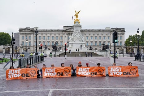 Campaigners from Just Stop Oil during a protest on The Mall, near Buckingham Palace in London, this morning.