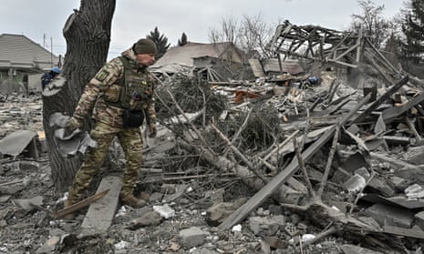 A military expert works at the site of a Russian missile strike in Zaporizhzhia, Ukraine.