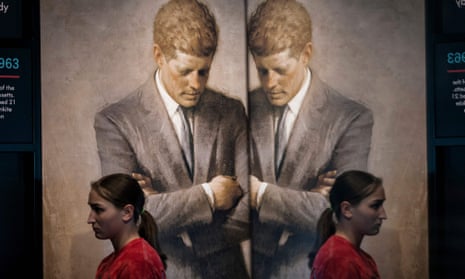 Student walks by JFK's official portrait, by Aaron Shikler