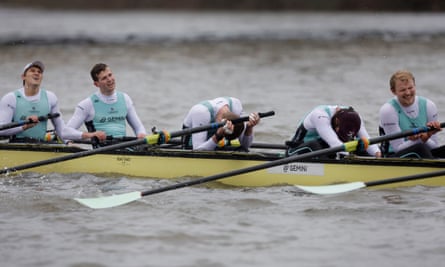 Agony for one of the men’s boats after the finish of the race on the River Thames near Chiswick Bridge during the Cambridge University Boat Race trials in December 2023.