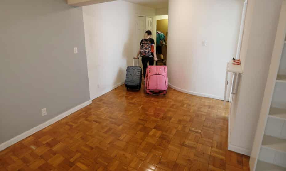  Olivia Boren leaves her apartment for the last time as she and her husband Chris Dooly are moving out of New York City amid the coronavirus pandemic, on 26 May 2020.