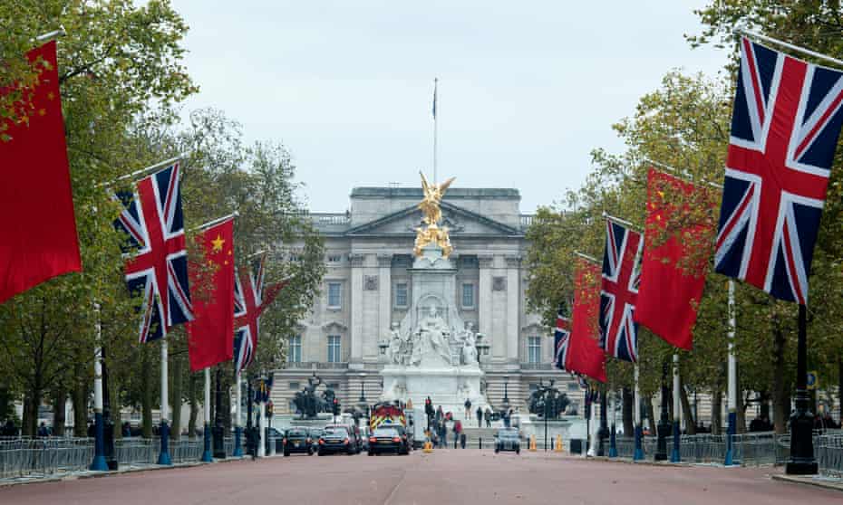 Chinese flags fly side by side with union flags on the Mall ahead of Xi Jinping’s state visit.