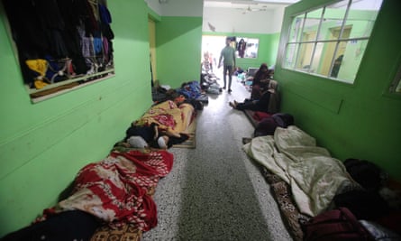 People sleeping in corridor of hospital