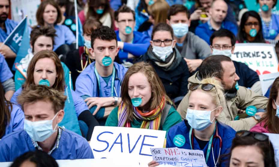Junior doctors staging a silent protest at Bristol Royal Infirmary during industrial action in May.