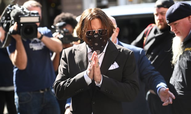 Johnny Depp arrives at court on Friday for the libel trial hearing against the Sun.