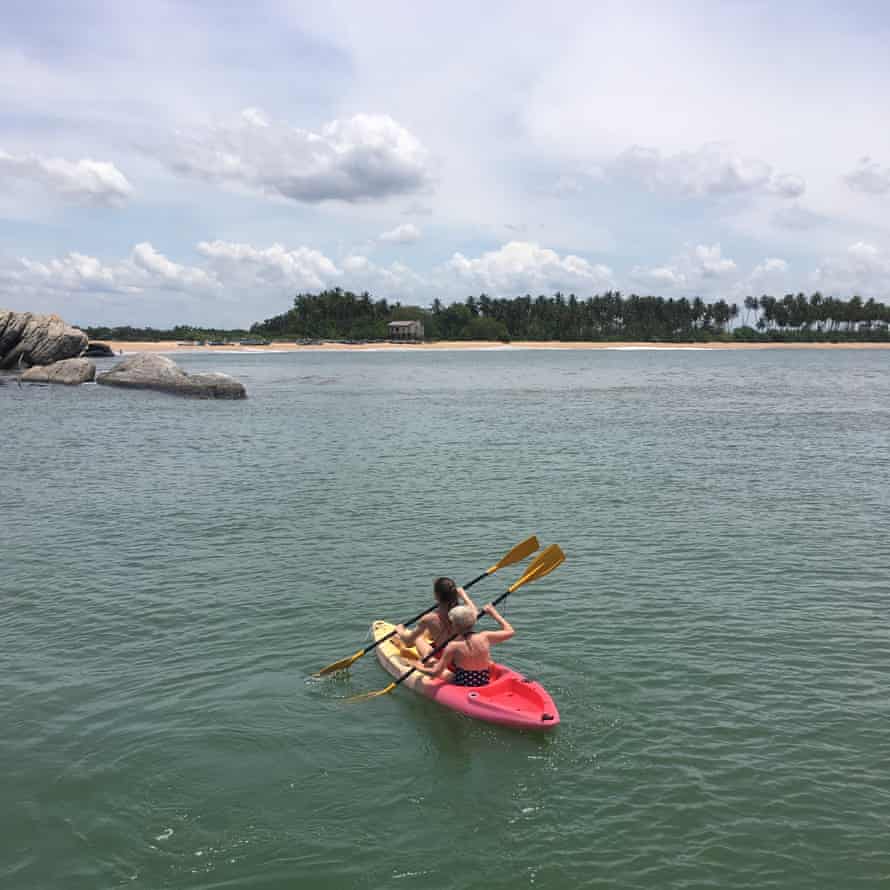 Liz and Laura take a kayak to the beach
