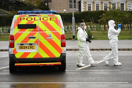 Forensic police officers attend the scene at Huntingdon Station after the stabbing attack on a train on 02 November 2025 in Huntingdon.