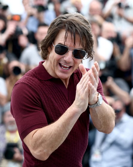 Cruise acknowledges fans at Cannes on Wednesday.