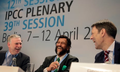Jochen Flasbarth, State Secretary of the German Enviroment Ministry, Rejendra K. Pachauri, Chairman of the IPCC, and Jochen Schuette, State Secretary of the German Sience Ministry, from left, share a light moment prior to a meeting of the Intergovernmental Panel on Climate Change, IPCC, in Berlin, Germany, Monday, April 7, 2014.
