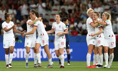 Ellen White of England (second right) celebrates with teammates after scoring her team’s second goal.