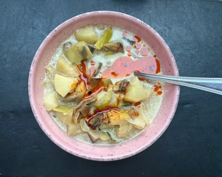 A chunky soup in a pink bow