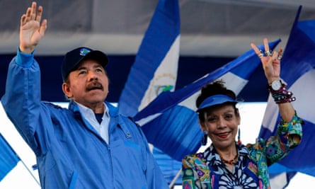 Nicaraguan president Daniel Ortega and his wife and vice-president Rosario Murillo, wave to supporters Wednesday during a rally in Managua, Nicaragua.
