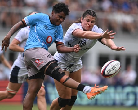 Ilona Maher (right) flies successful to effort and thwart Fiji’s Litiana Vueti during an world successful Washington DC