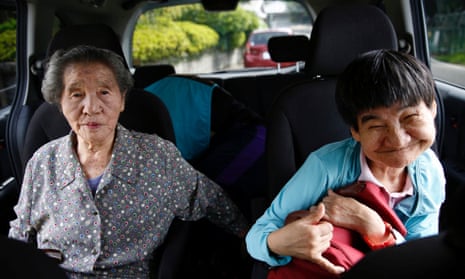 Shinobu Sakamoto, right, with her mother, is a survivor of a 1950s industrial disaster in which tens of thousands of people were poisoned when wastewater containing methylmercury seeped into Minamata bay, Japan. 