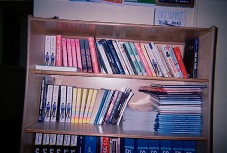 Image of a bookshelf lined with books.
