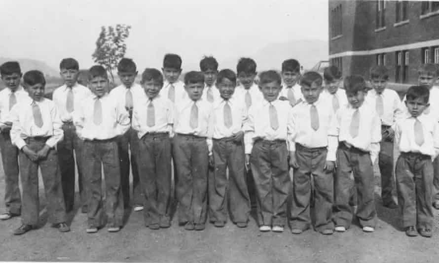 Children kept at the Kamloops Indian Residential school in Kamloops, British Columbia, in 1931, where unmarked graves have been found with the remains of 215 children whose deaths went undocumented.
