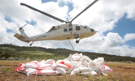 Aid supplies for people affected by Cyclone Idai are airlifted by helicopter for distribution near Chipinge, Zimbabwe