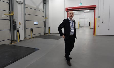 Mike Sellers, the port director, at the large, empty structure of the border control post.