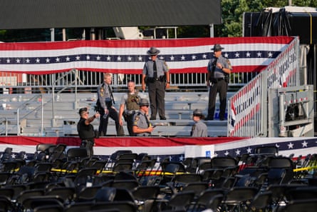 Law enforcement officers at campaign rally site after the assassination attempt on Donald Trump, in Butler, Pennsylvania, on 13 July.
