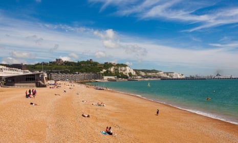 Dover beach, with the castle, white cliffs and port in the background. The town is on the frontline of the small boats crisis, says  Labour leader Keir Starmer.
