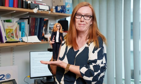Prof Sarah Gilbert receives her Barbie doll in Oxford