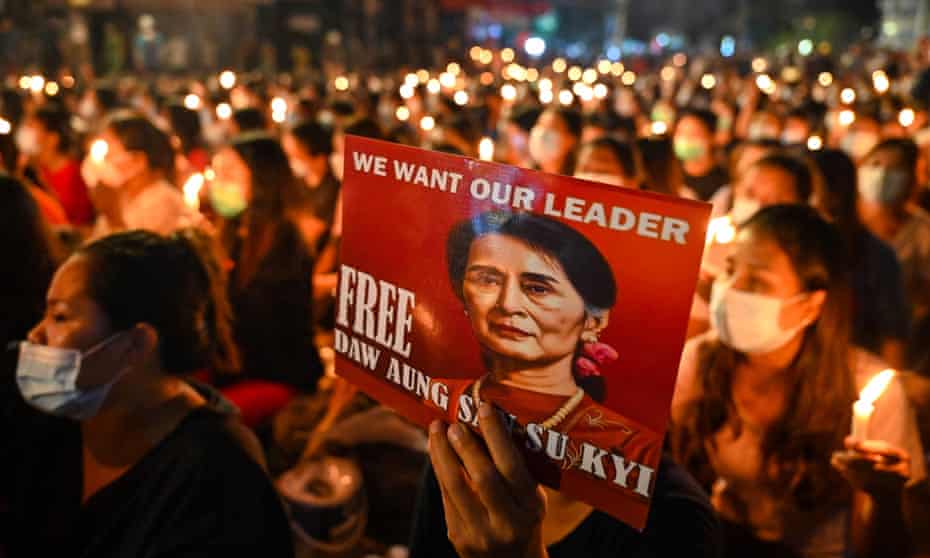 Protesters in Yangon call for the release of Aung San Suu Kyi. A businessman close to Myanmar’s military regime has alleged she accepted huge bribes in cash. 