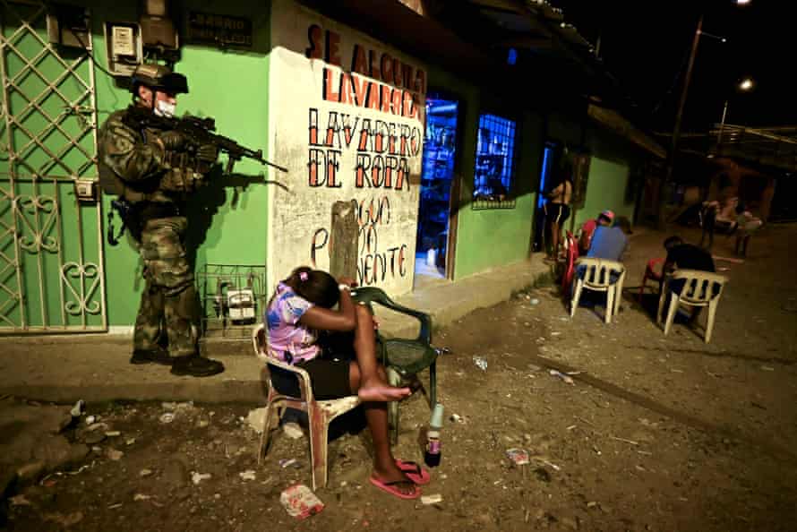 Colombian Marine Infantry soldiers patrol the streets of Buenaventura, where members of the local armed group are fighting for control of drug trafficking in the area.