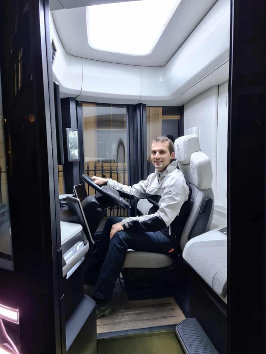 Jasper Jolly in the cab of a Volta Trucks electric truck demonstrator.