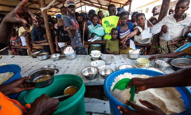 Refugees from the DRC are fed at the Kagoma reception centre within the Kyangwali settlement.