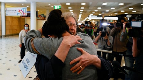 Tearful reunions as Australia reopens international borders for first time in pandemic – video