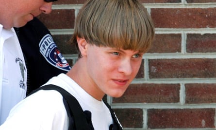 Dylann Roof is led into the courthouse in Shelby, North Carolina, in June 2015.