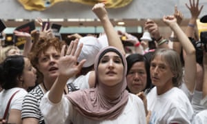 On Capitol Hill Thursday, hundreds of activists, including actress Susan Sarandon, center left, and Linda Sarsour (center) challenged the separation of families.