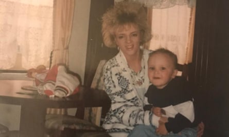 ‘Looking back, it was an upbringing out of time with the 90s, more like one of the 70s’: Lewis as a toddler with his mum.