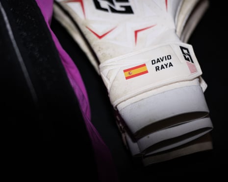 A detailed view of David Raya’s goalkeeper gloves inside the Arsenal dressing room prior to the Champions League quarter-final first leg match between Sporting and Arsenal