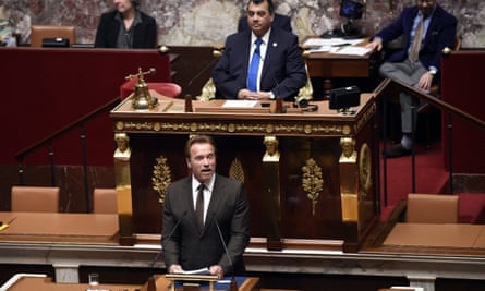 Former governor of California and actor Arnold Schwarzenegger delivers a speech to the French parliament.