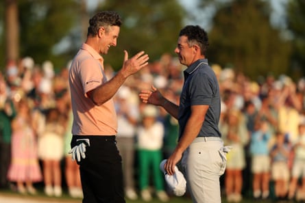 Rory McIlroy shakes hands with Justin Rose after the playoff hole of the 2025 Masters