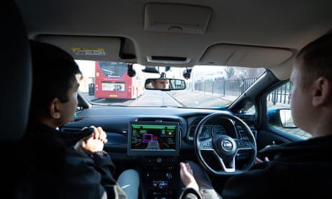 A self-driving Nissan Leaf car on a trial drive in south London.