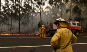 Rural Fire Service volunteers contain a small bushfire on the NSW south coast in January