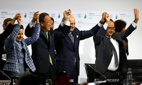 French President Francois Hollande, right, French Foreign Minister and president of the COP21 Laurent Fabius, second right, United Nations climate chief Christiana Figueres, left, and United Nations Secretary General Ban Ki-moon hold their hands up in celebration after the final conference at the COP21 in 2015