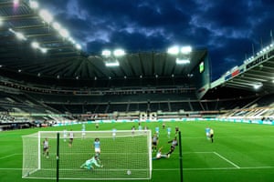 Joe Willock (front right) puts Newcastle United ahead after his penalty was saved.