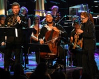 Ben Goldscheider, Sheku Kanneh-Mason and Jess Gillam on stage at the BBC Proms