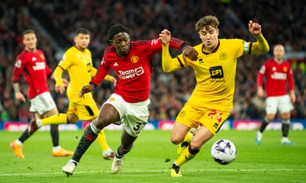 Oliver Arblaster in action against Manchester United.
