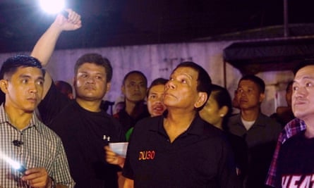 President Rodrigo Duterte visits site of fire at the shopping mall in Davao.