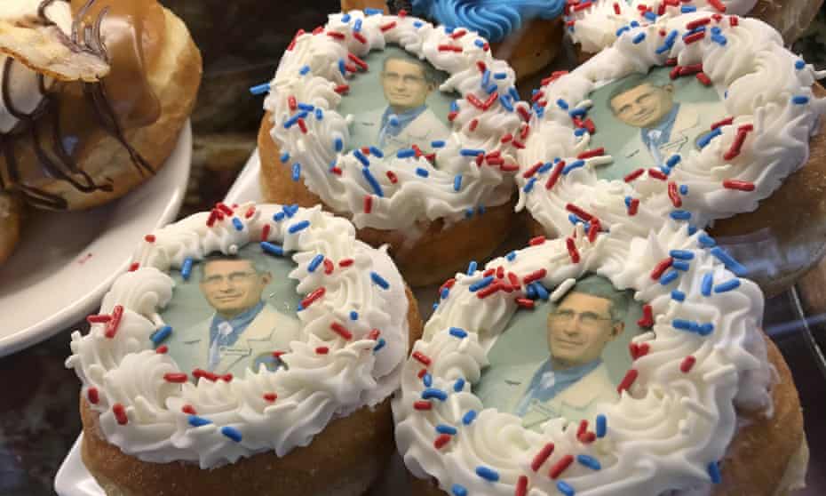 Doughnuts bearing the likeness of Dr Anthony Fauci rest on a plate at Donuts Delite in Rochester, New York.