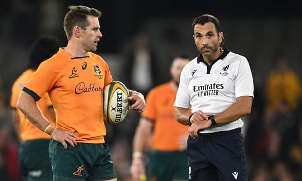 Bernard Foley with referee Mathieu Raynal in the controversial closing stages of last week’s match against New Zealand in Melbourne.